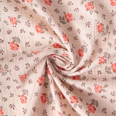 Tissu Double gaze de Coton Fleuris Olymp sur fond Rose clair - Par 10 cm