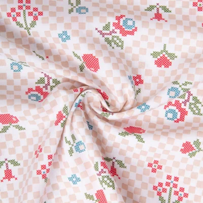 Tissu Coton imprimé Arty Pomsy point de croix sur fond Blanc - Par 10 cm