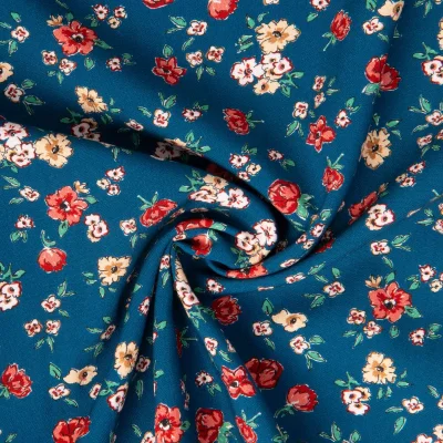 Tissu Viscose imprimé Sylore fleuris sur fond Bleu - Par 10 cm