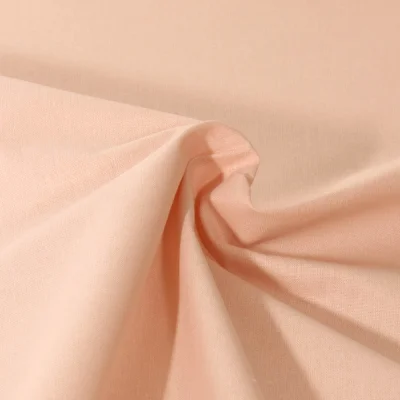 Tissu Coton enduit uni Rose blush - Par 10 cm