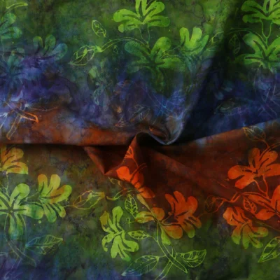 Tissu Coton imprimé Batik Orianza sur fond Multicolore - Par 10 cm