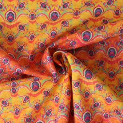 Tissu Voile de Coton Pluméa sur fond Jaune or - Par 10 cm