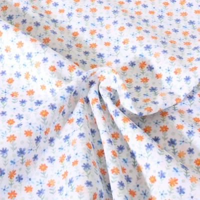 Tissu Popeline de Coton légère Petites fleurs sur fond Blanc - Par 10 cm