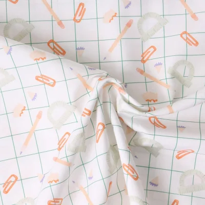 Tissu Coton imprimé  Graphika papeterie pop sur fond Blanc - Par 10 cm