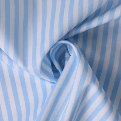 Tissu Coton imprimé  rayé Lisalou sur fond Bleu layette - Par 10 cm