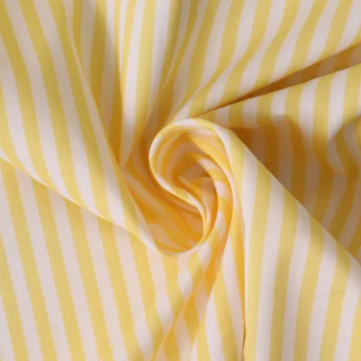 Tissu Coton imprimé  rayé Lisalou sur fond Jaune pastel - Par 10 cm