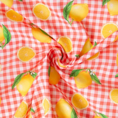 Tissu Coton imprimé Carreaux et citrons, oranges jaunes sur fond Blanc - Par 10 cm