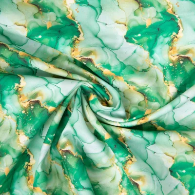 Tissu Coton imprimé Agate marbré Vert et Or sur fond Vert clair - Par 10 cm
