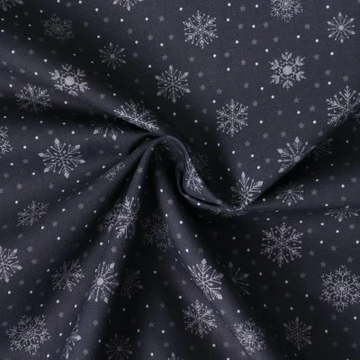Tissu Coton imprimé Elia flocons argentés sur fond Bleu marine - Par 10 cm