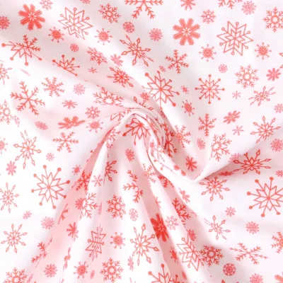 Tissu Coton imprimé Eryna flocons Rouges sur fond Blanc - Par 10 cm