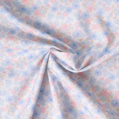 Tissu Popeline de Coton légère floral pastel bleu ciel pastel, rose et beige sur fond Blanc - Par 10 cm
