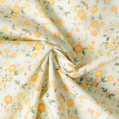 Tissu Popeline de Coton légère Petites fleurs oranges sur fond Blanc cassé - Par 10 cm