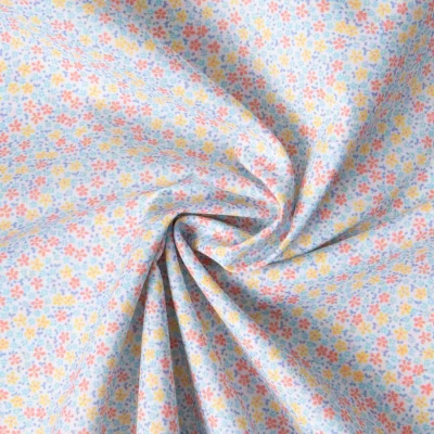 Tissu Batiste de Coton imprimé Fleuris patel sur fond Blanc - Par 10 cm