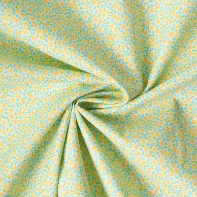 Tissu Batiste de Coton imprimé Fleuris sur fond Vert pâle - Par 10 cm