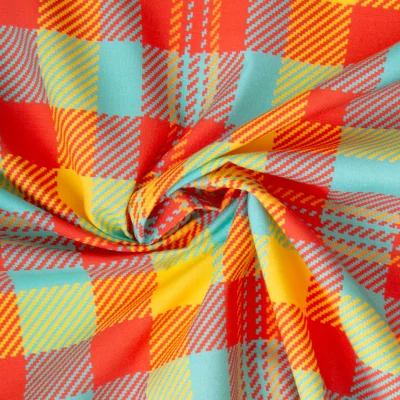 Tissu Madras Coton Carreaux rouge et turquoise sur fond Jaune - Par 10 cm