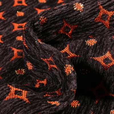 Tissu Jacquard relief velours Emir sur fond Orange - Par 10 cm