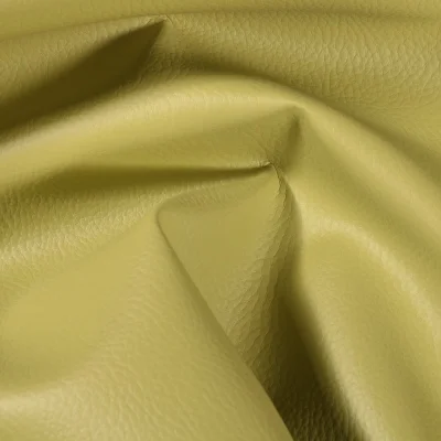 Simili cuir d&#039;ameublement uni Vert fenouil - Par 50 cm