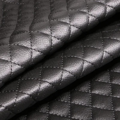 Tissu Simili cuir matelassé uni Chelsy Noir - Par 10 cm