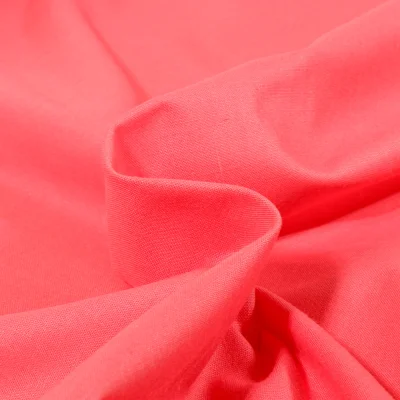 Tissu Coton uni Corail - Par 10 cm