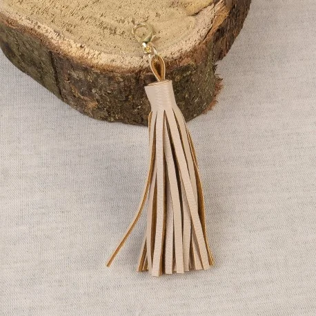Pompon avec fermoir Beige