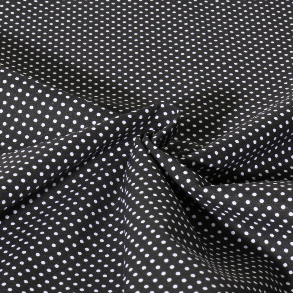 Tissu Popeline de Coton  Carmella à pois blanc sur fond Noir