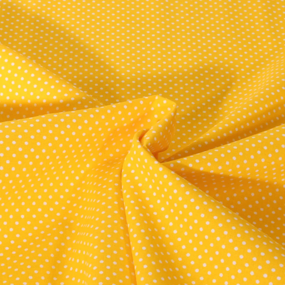 Tissu Popeline de Coton  Carmella à pois blanc sur fond Jaune