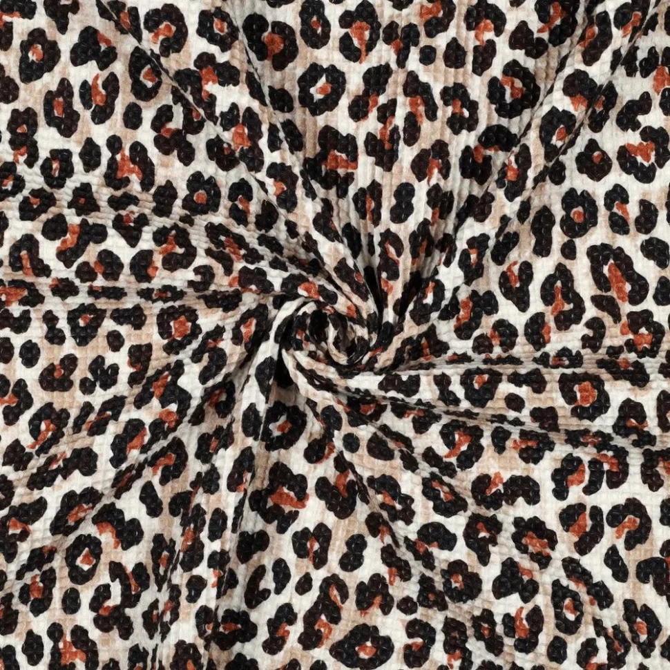 Tissu Nid d'abeille digital imprimé Léopard Noir et Rouille sur fond Blanc cassé