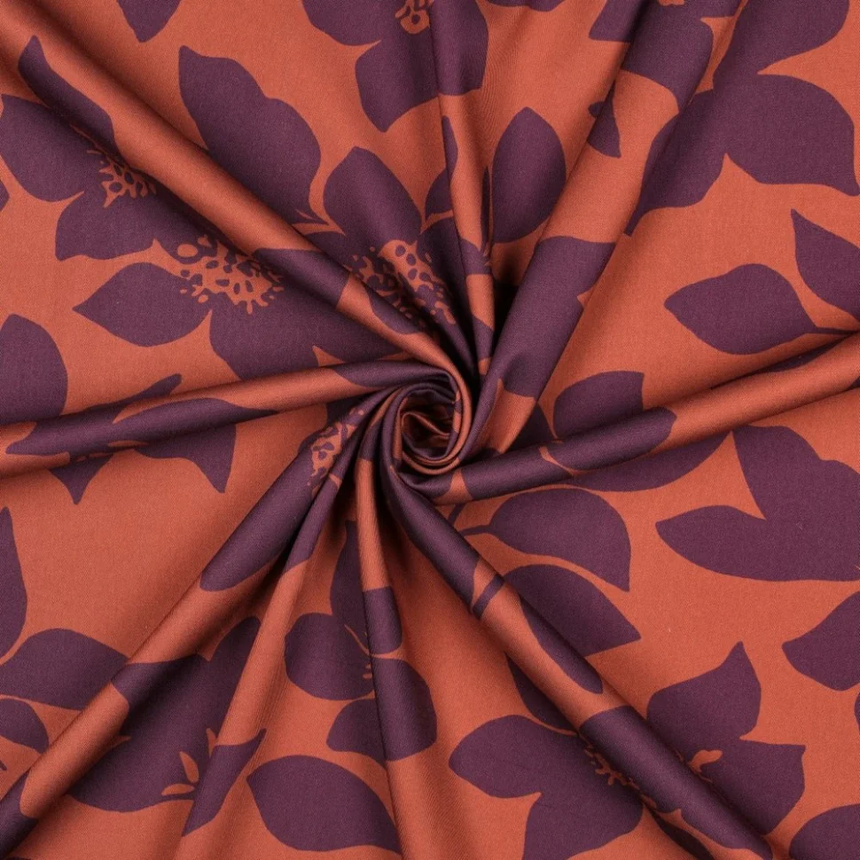 Tissu Viscose élasthanne stretch Grandes fleurs Prune sur fond Terracotta