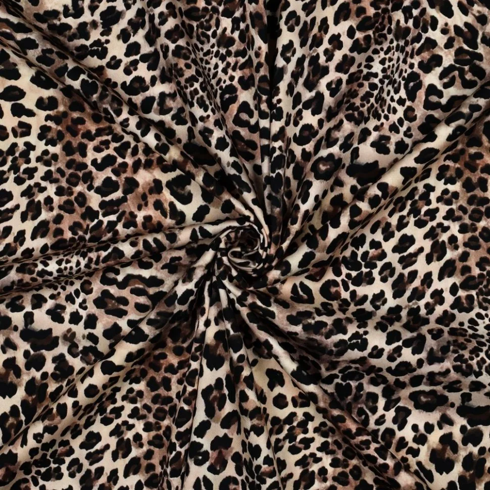 Tissu Viscose élasthanne stretch digital Rosella motif léopard sur fond Ecru
