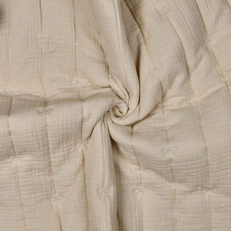 Tissu Double gaze de Coton Matelassé réversible Petits noeuds brodés sur fond Ecru
