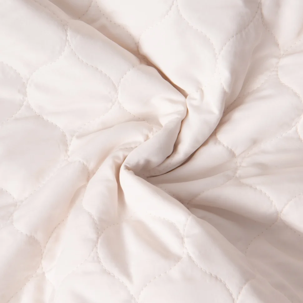 Tissu Doudoune matelassé Garance   sur fond Ecru
