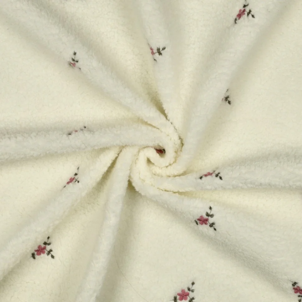 Tissu Bouclette Teddy Fleurs Maya brodées sur fond Blanc cassé