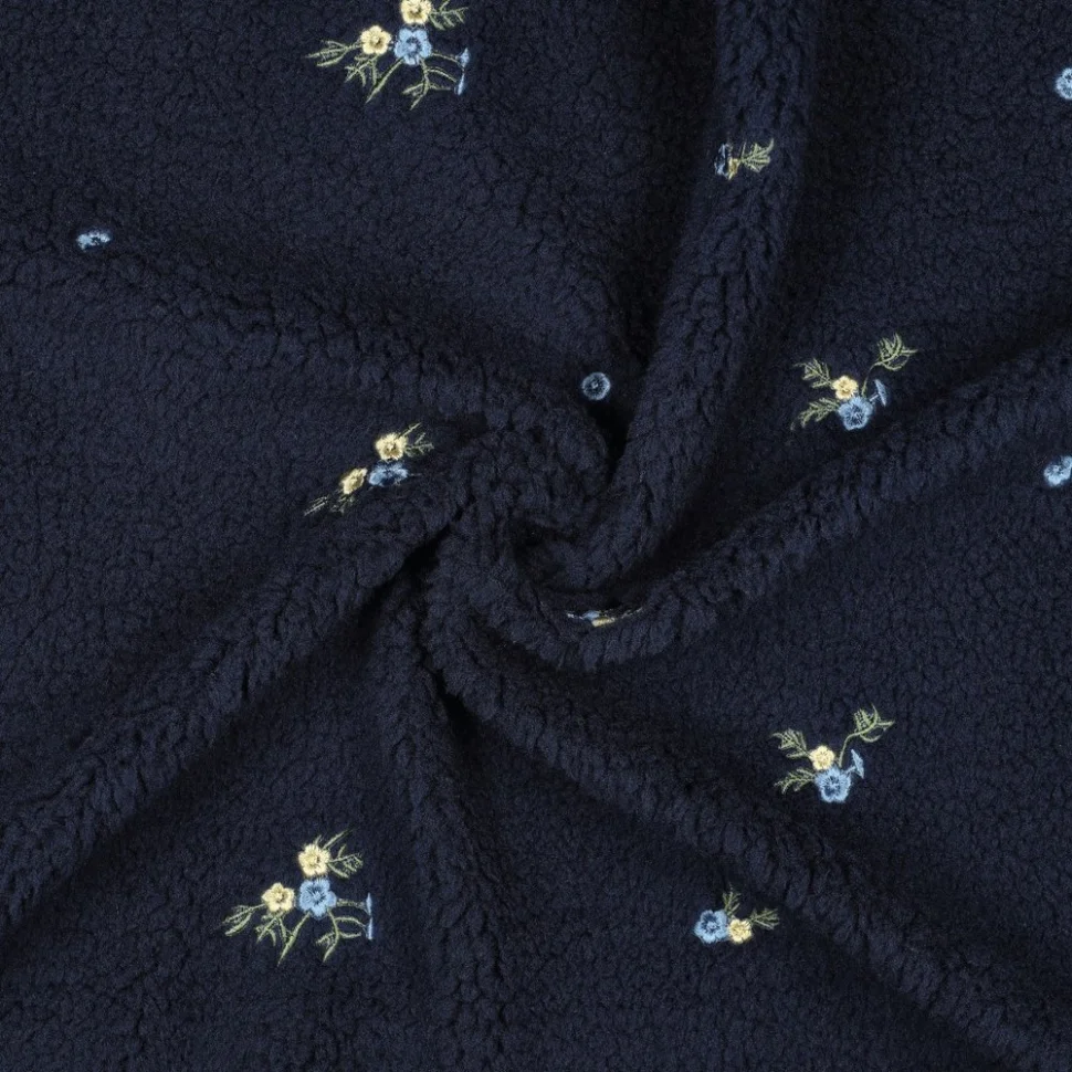 Tissu Fausse fourrure Mouton Teddy Fleurs Nina brodées sur fond Bleu marine