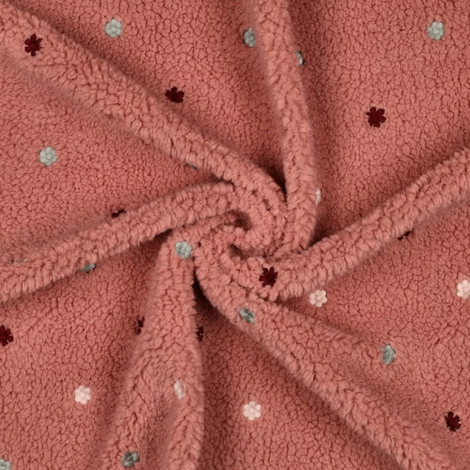 Tissu Fausse fourrure Mouton Teddy petites fleurs brodées sur fond Rose