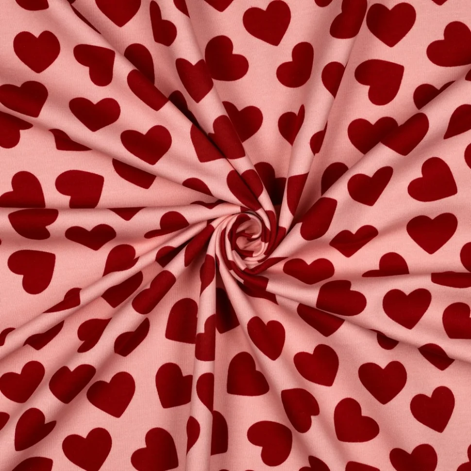 Tissu Sweat léger envers molletonné Emmy coeurs Rouge sur fond Rose