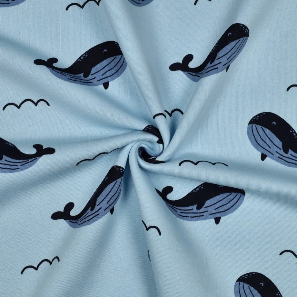Tissu Sweat envers polaire Timéo baleines sur fond Bleu ciel