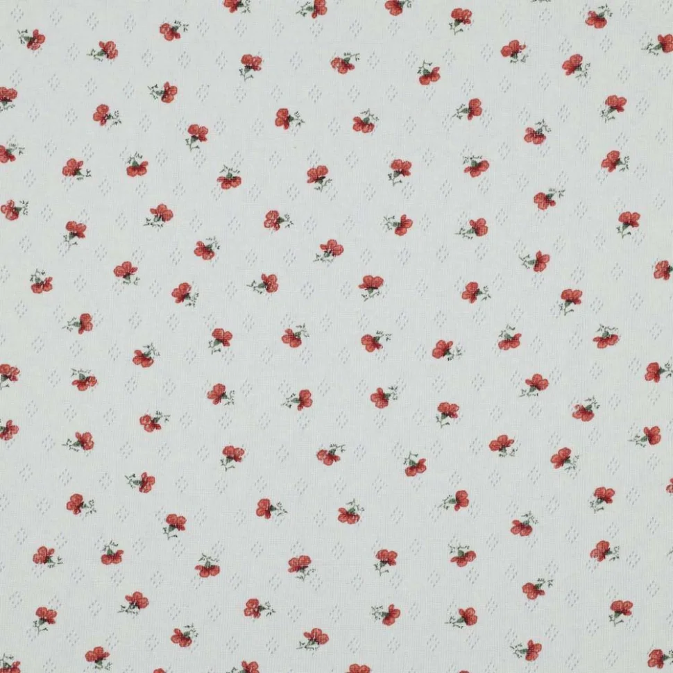 Tissu Jersey Coton ajouré Petites roses rouges sur fond Blanc