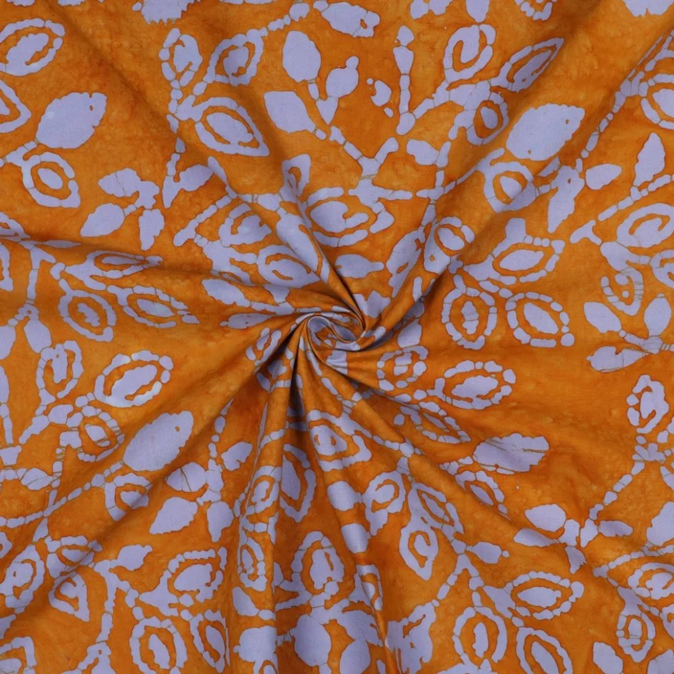 Tissu Batik Coton Azura sur fond Rouille