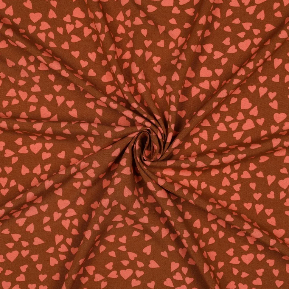 Tissu Viscose EcoVero petits coeurs Orange sur fond Terracotta