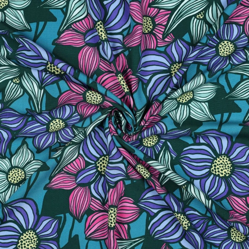 Tissu Viscose EcoVero tapis fleurs Rose, Bleu et Vert jade sur fond Vert sapin