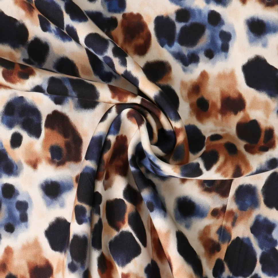 Tissu Viscose Inès motif façon léopard Camel sur fond Beige sable