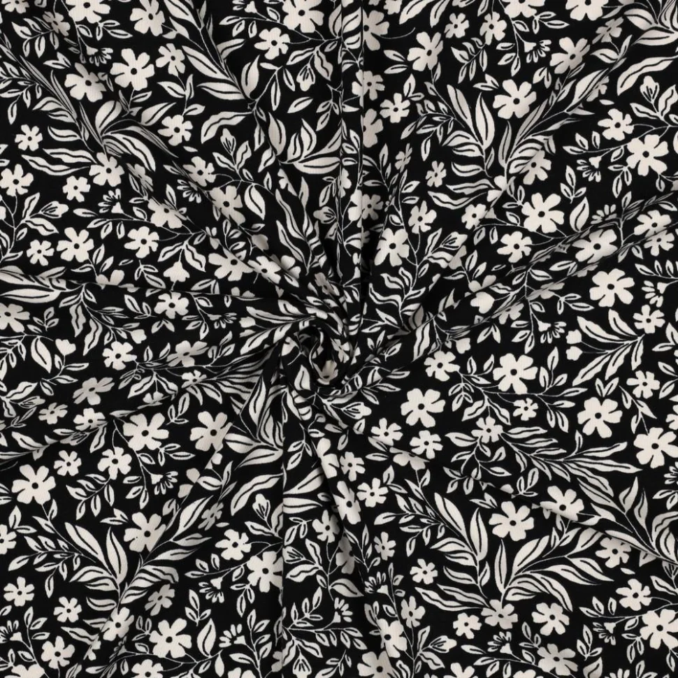 Tissu Jersey Coton imprimé Petites Fleurs Blanches sur fond Noir