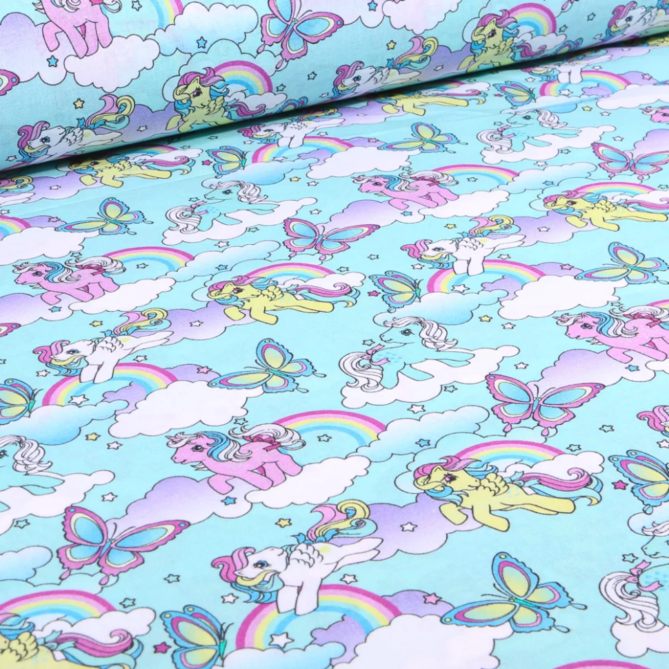 Tissu Coton imprimé sous licence My little Pony sur fond Bleu turquoise