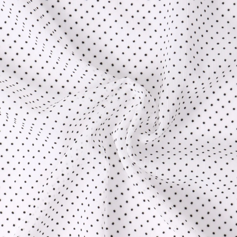 Tissu Mousseline  texturé Mini pois sur fond Blanc