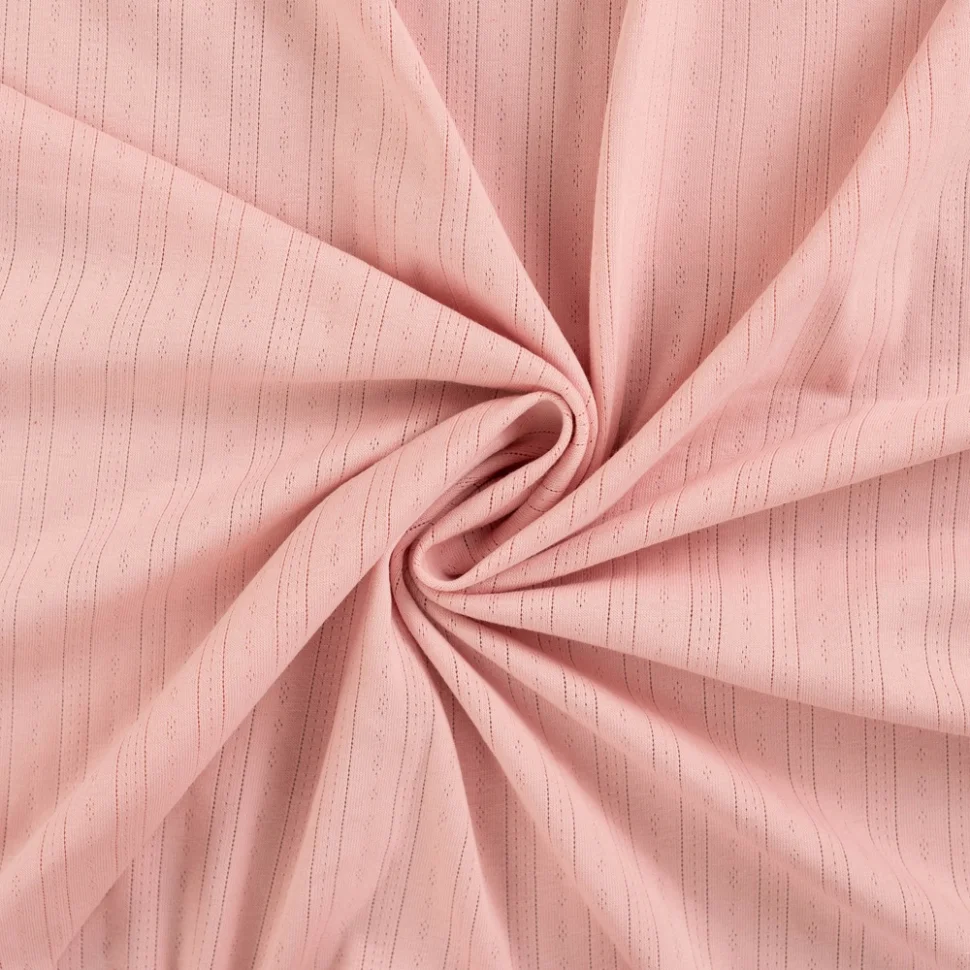 Tissu Jersey Coton ajouré uni Lio Rose poudré