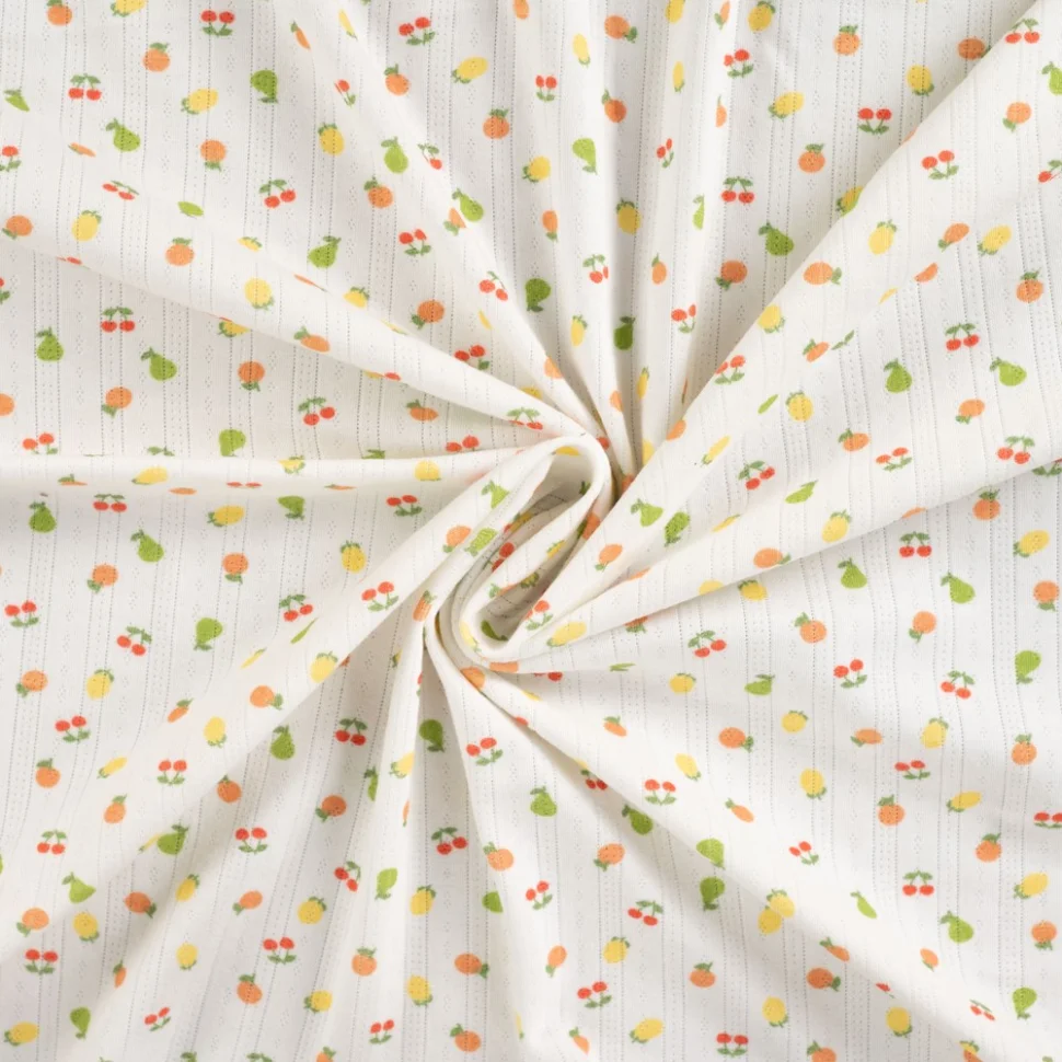 Tissu Jersey Coton ajouré Fruits sur fond Blanc