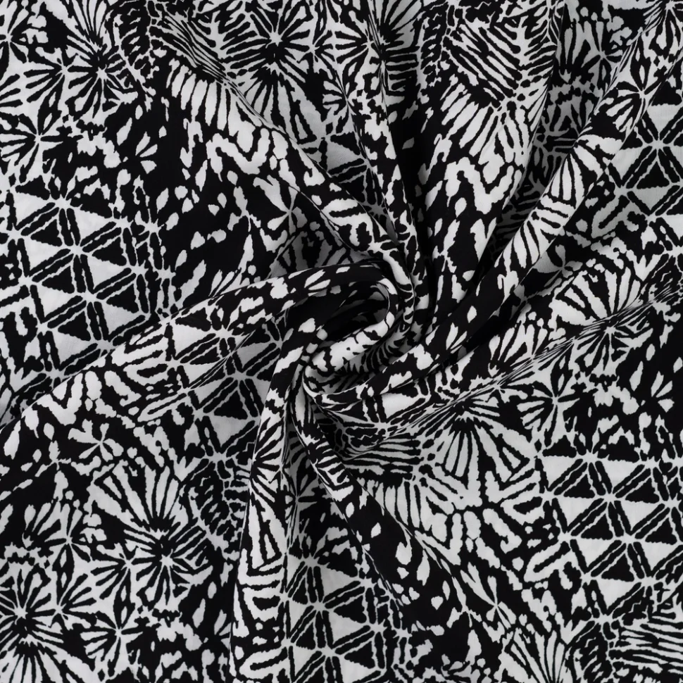 Tissu Viscose imprimé Motifs blancs destructurés sur fond Noir