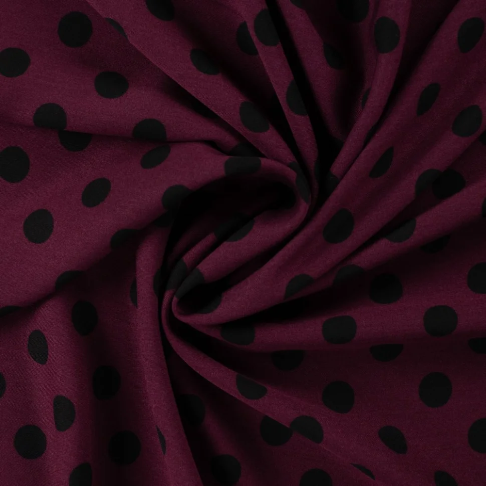 Tissu Viscose twill pois Noir sur fond Lie de vin