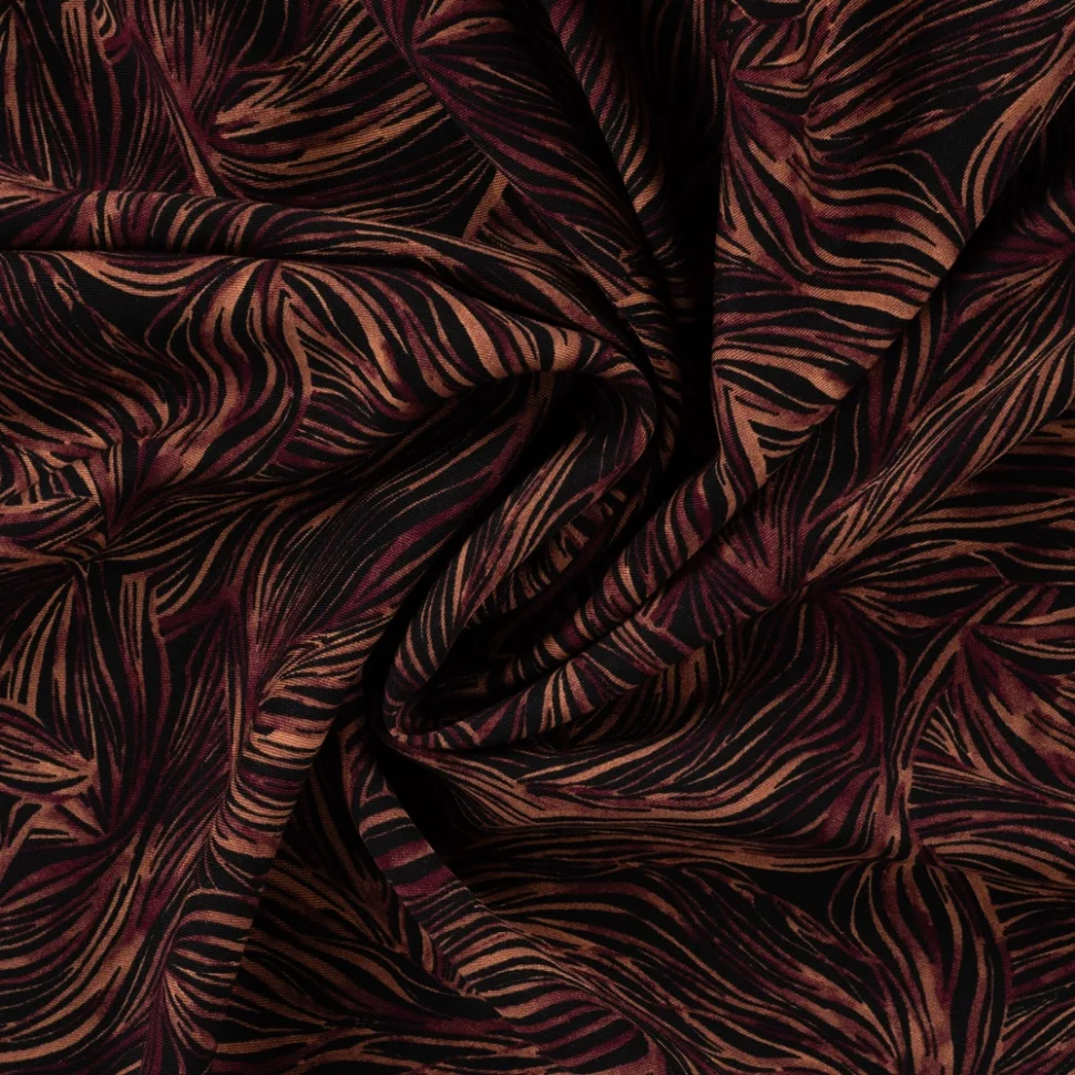 Tissu Viscose twill feuillage graphique Terracotta et Bordeaux sur fond Noir