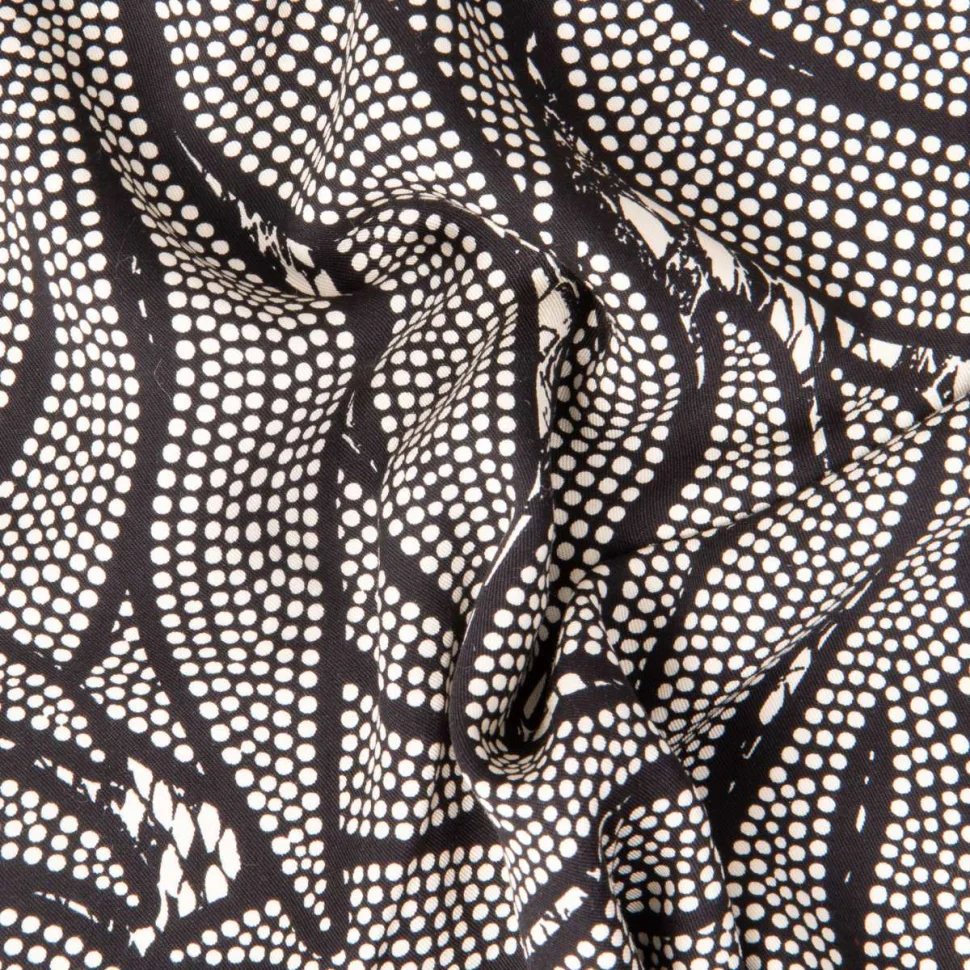 Tissu Viscose Twill EcoVero feuilles en pointillés sur fond Noir